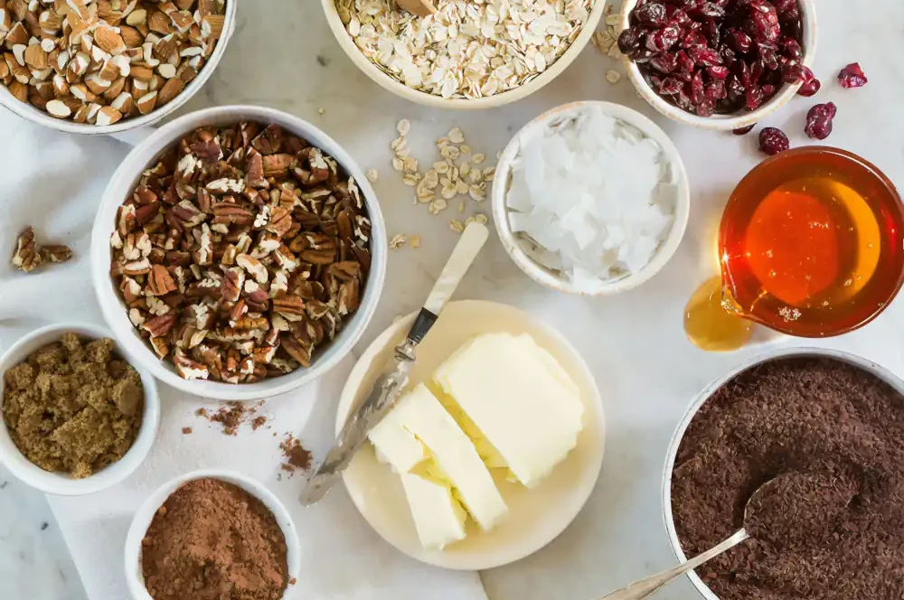 bowls of baking ingredients on a kitchen table